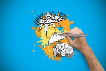 Composite image of hand holding a silver pen