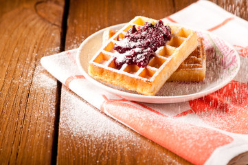 waffles with jam, on the boards