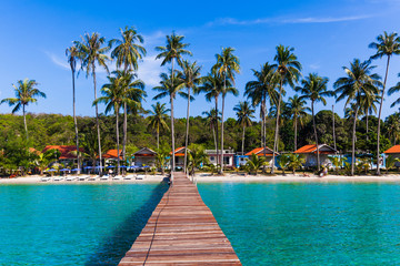 Wooden pathway.  Tropical Resort. boardwalk on beach