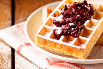 waffles with jam, on the boards