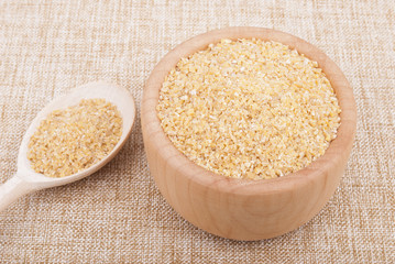 Wheat cereal in a bowl on the table.