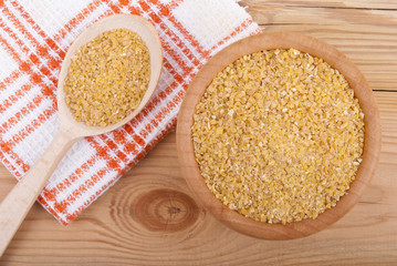 Wheat cereal in a bowl on the table.