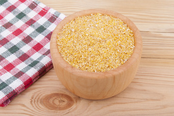 Wheat cereal in a bowl on the table.