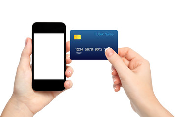 female hands holding phone and credit card on isolated backgroun