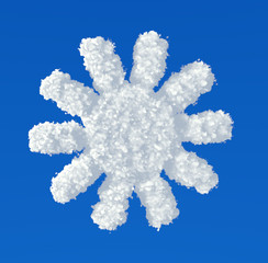 Clouds in shape of sun or flower on a blue background