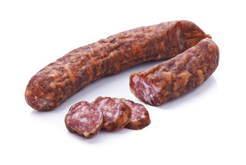 Sliced dried salami isolated on white background