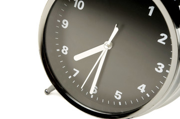 Black and silver alarm clock