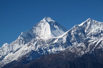 Snow capped peaks of Dhaulagiri and Tukuche Peak