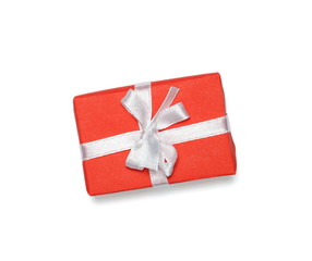 Wrapped gift box with ribbon bow, isolated on white
