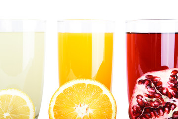 Fresh citrus juices with different citruses