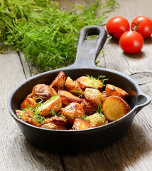 Roasted potato in a frying pan