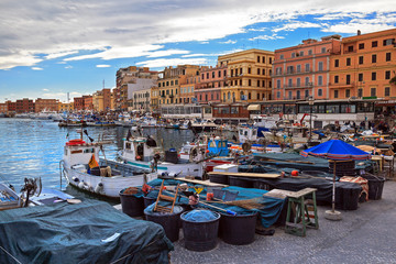 View of the small port of Anzio in Italy with the small beach and the fishermen's boats