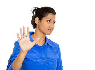 Woman bad attitude giving talk to hand gesture palm outward