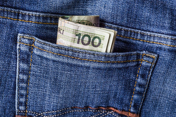 several Polish banknotes jeans pocket