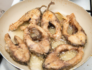 fish fried in a pan