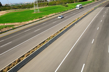 View of landscape with two way highway.  Central Israel.