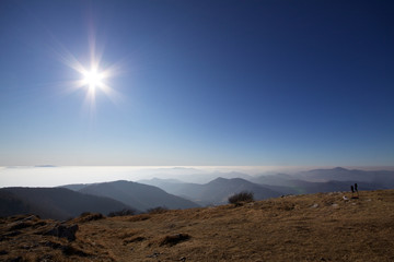 Fototapeta premium Sunny sky above clouds