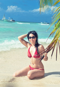 woman on the tropical beach .