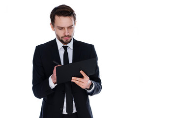 Businessman looking at the tablet