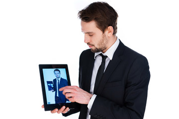 Man displaying a handheld tablet computer