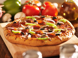 supreme italian pizza with pepperoni and toppings
