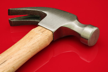 Hammer On A Red Background