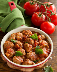 Meatballs in Italian tomato sauce.