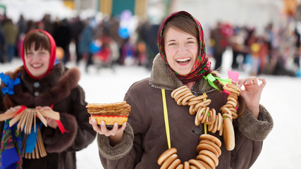 girls celebrating  Pancake Week at Russia