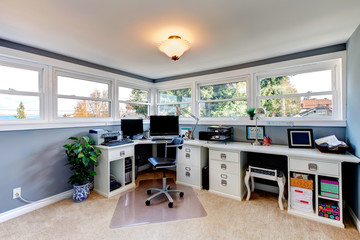 White and blue bright office room