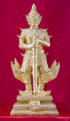 Antique golden giant statue