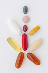 Pills on white background