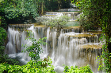 Fototapeta na wymiar Deep forest Waterfall in Kanchanaburi
