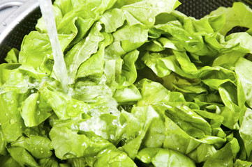 water pouring to the fresh salad