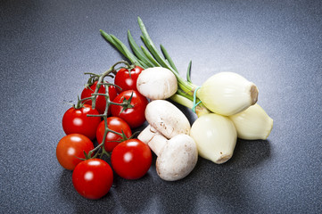 vegetables fresh tomato with onion, garlic and spices on cutting