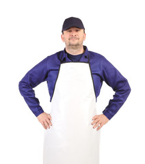 Worker wearing white apron.