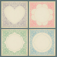Vintage greeting cards with swirls and floral motifs.