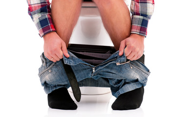 Man on toilet bowl