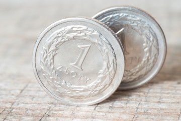 Polish money on wooden table