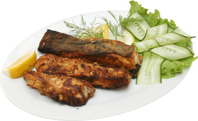 Grilled Fish Fillet with on BBQ with vegetables