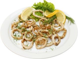 Fish salad with squid rings and testy herbs