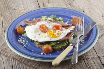 breakfast with bacon and fried egg