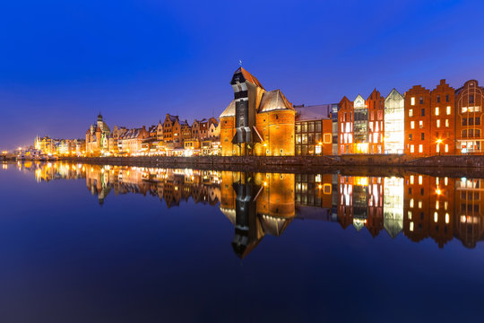 Old town of Gdansk with ancient crane at night, Poland