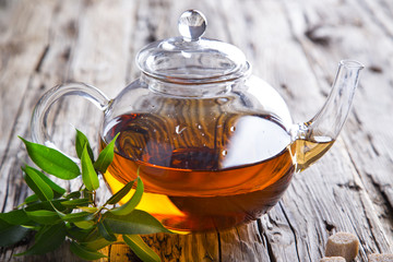 Transparent cup of green tea