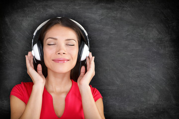 Music in headphones - Beautiful woman listening