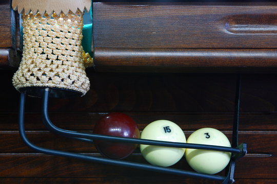 billiard table with green cloth and balls