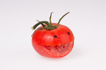 One happy, smiling tomato.