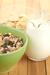 Delicious and healthy cereal in bowl with milk