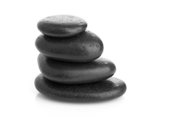 Growing piled up pebbles on a white background