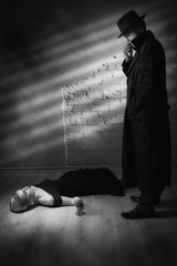 Detective investigating the crime scene
