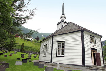 Fototapeta na wymiar Geiranger church and cemeteries Norway.